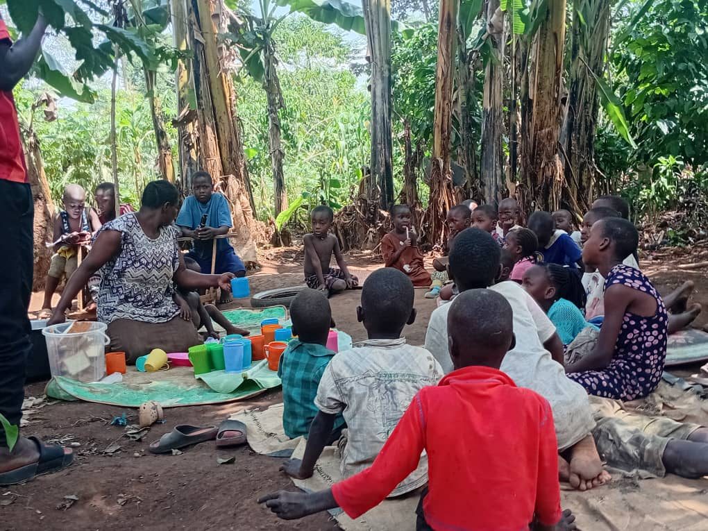 SafeHaven children gathered together for a meal